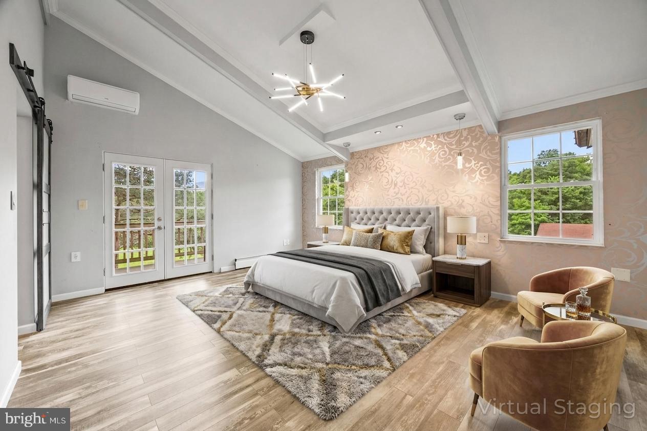 2370 Highway 211 Luray, VA 22835 - Photo 24 of 68 a spacious bedroom with a bed and a large window