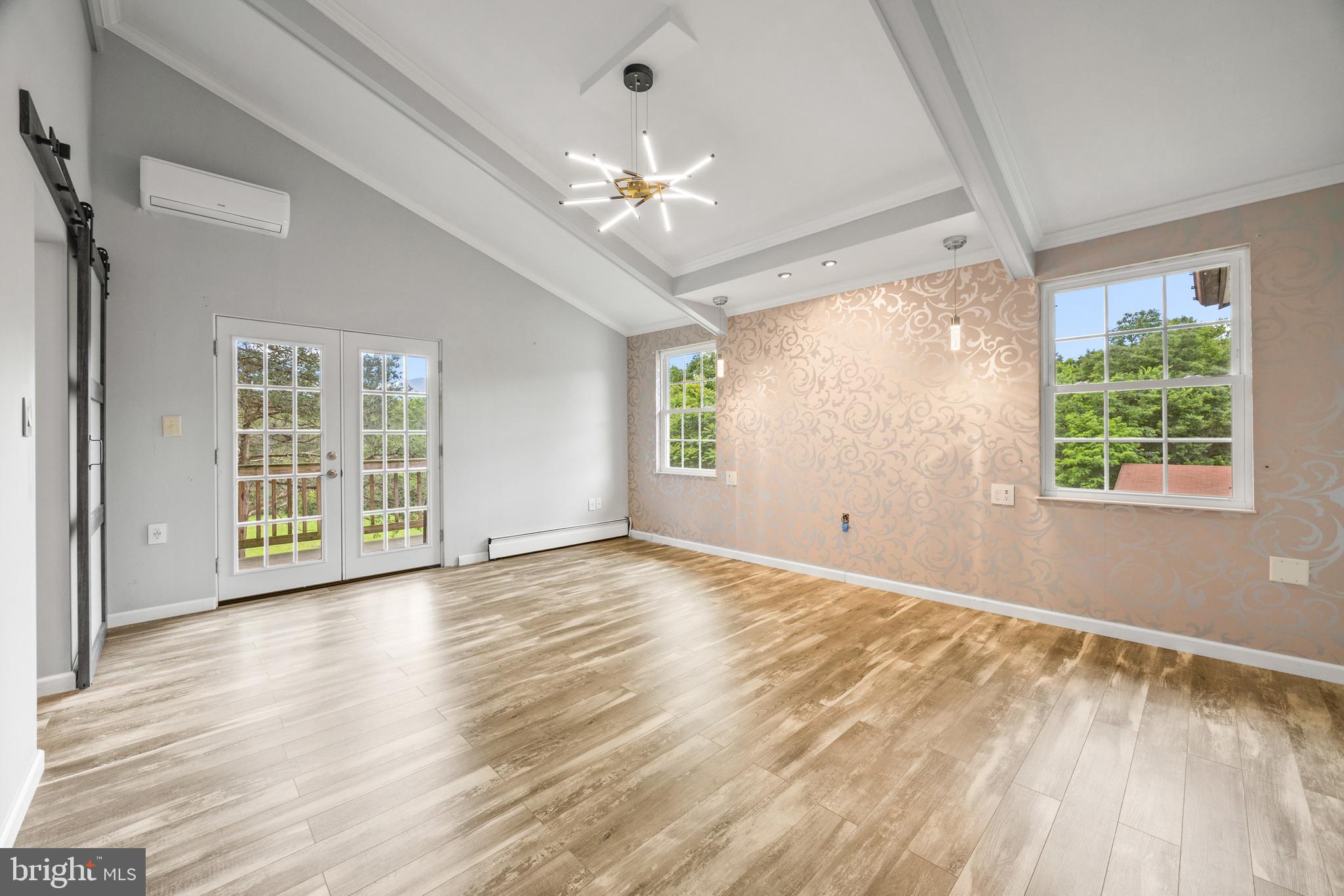 2370 Highway 211 Luray, VA 22835 - Photo 25 of 68 a view of an empty room with wooden floor and a window