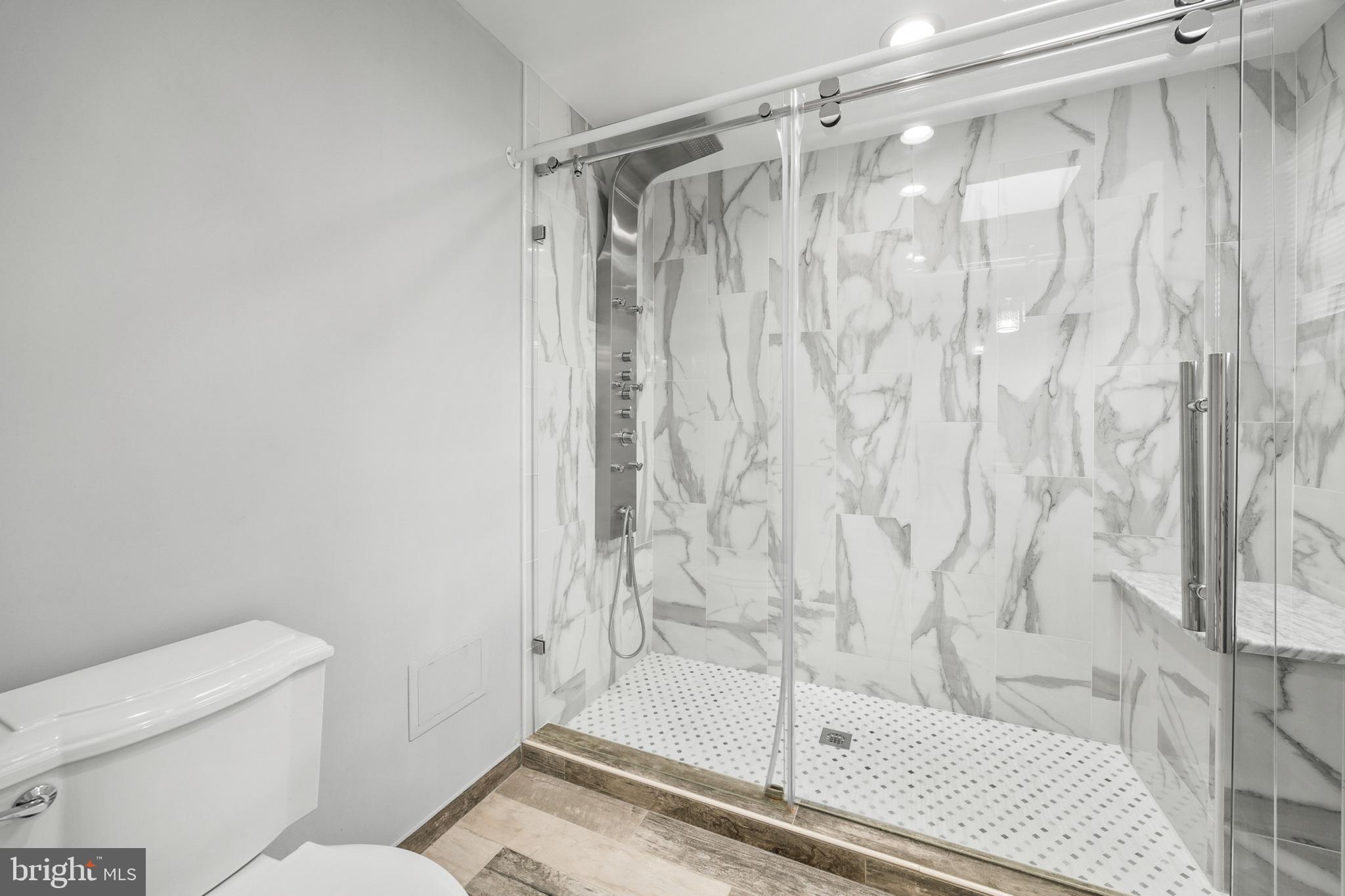 2370 Highway 211 Luray, VA 22835 - Photo 28 of 68 a bathroom with a shower curtain and a toilet