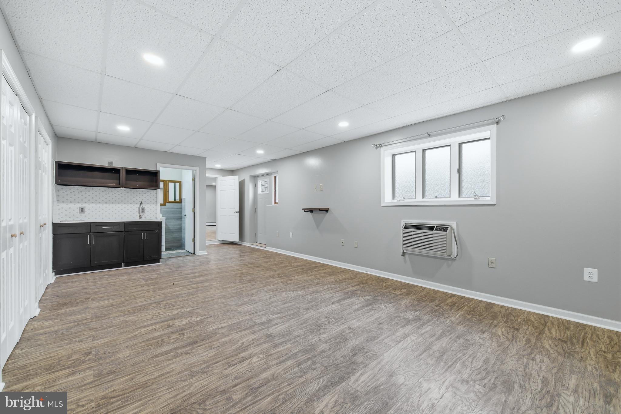 2370 Highway 211 Luray, VA 22835 - Photo 36 of 68 a view of an empty room with a kitchen and a window