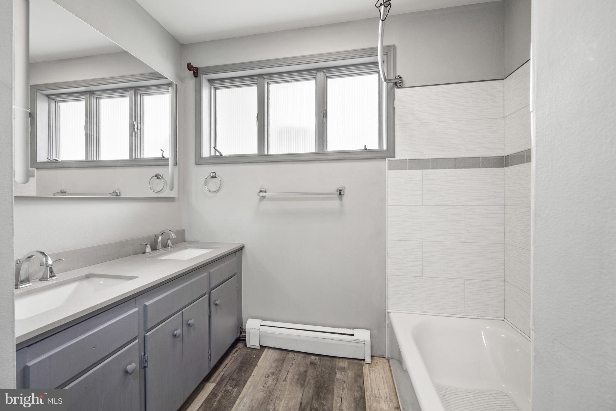 2370 Highway 211 Luray, VA 22835 - Photo 43 of 68 a bathroom with a sink and a bathtub