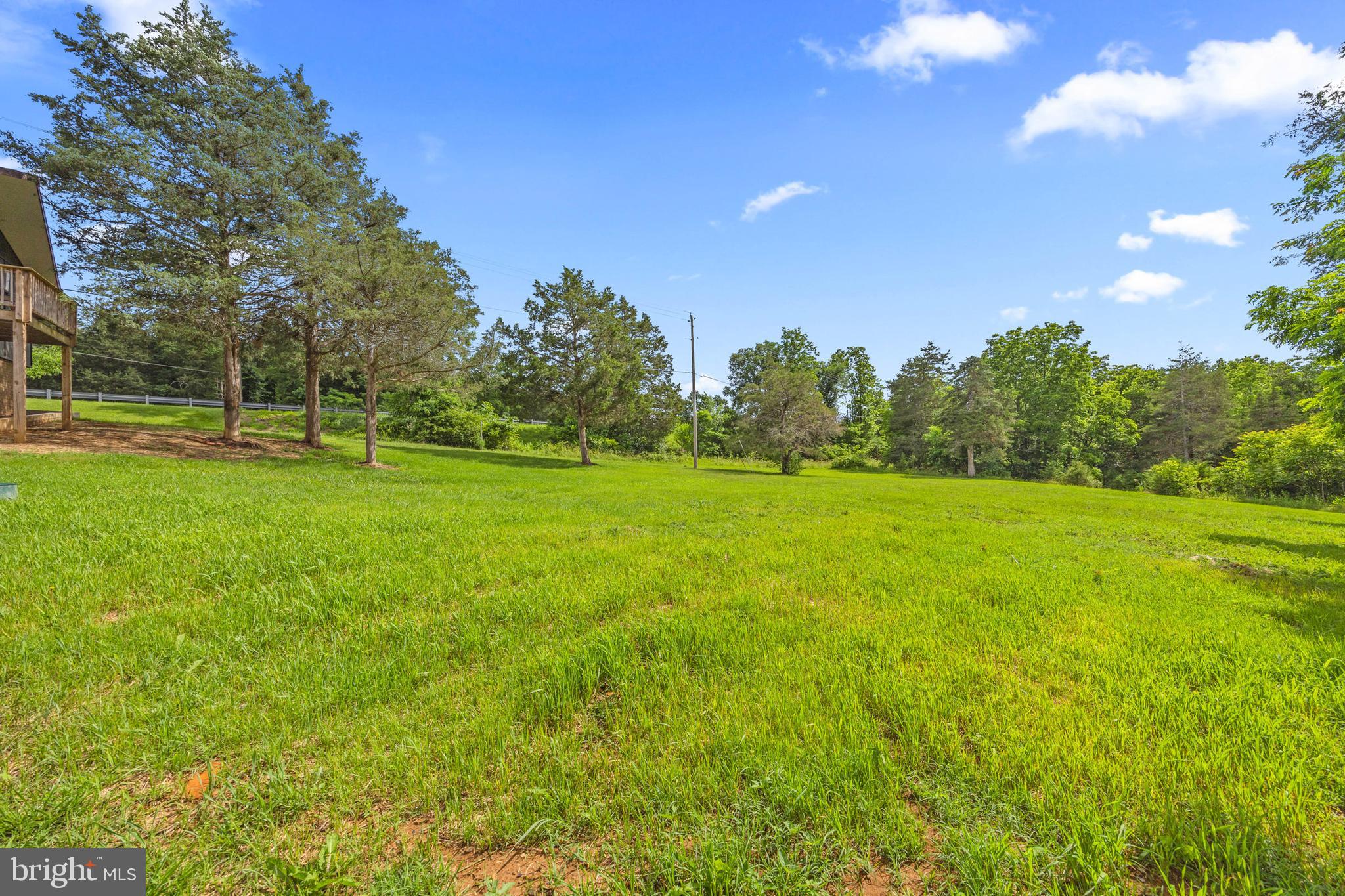 2370 Highway 211 Luray, VA 22835 - Photo 52 of 68 a view of a field with trees in the background