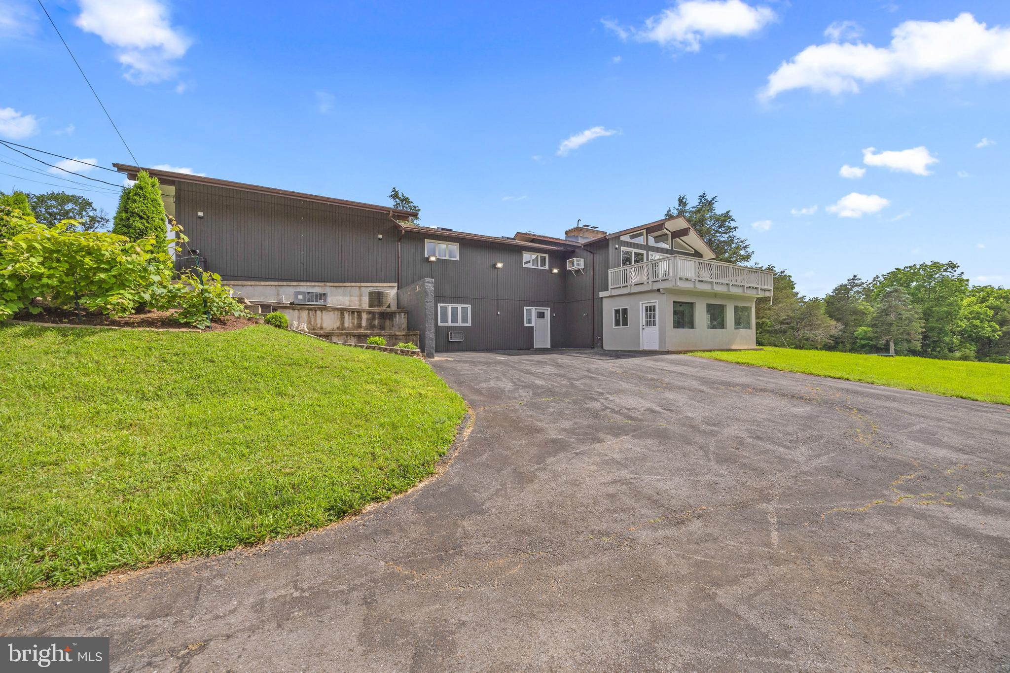 2370 Highway 211 Luray, VA 22835 - Photo 62 of 68 a view of a house with a yard and a garage