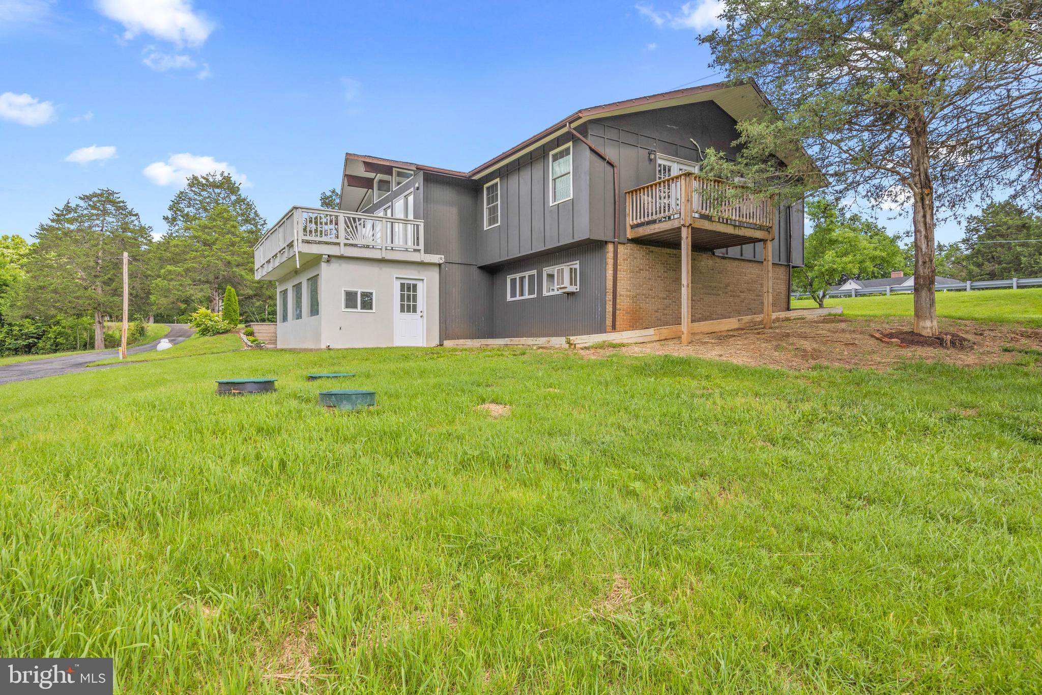 2370 Highway 211 Luray, VA 22835 - Photo 66 of 68 a view of a big house with a big yard and large trees