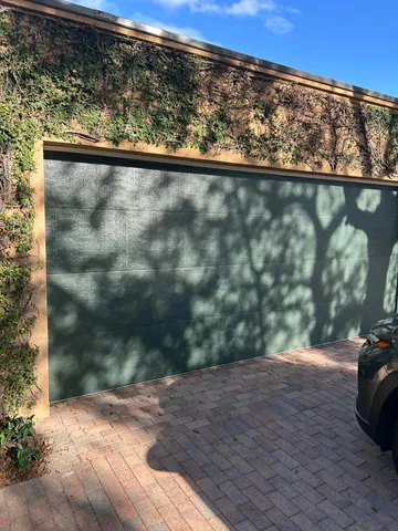 a view of a yard from a balcony