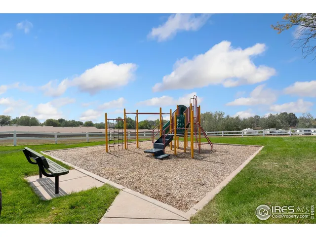 a view of a lake with a sitting space