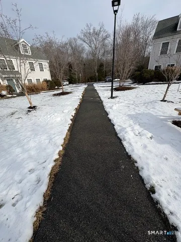 a view of a backyard of the house
