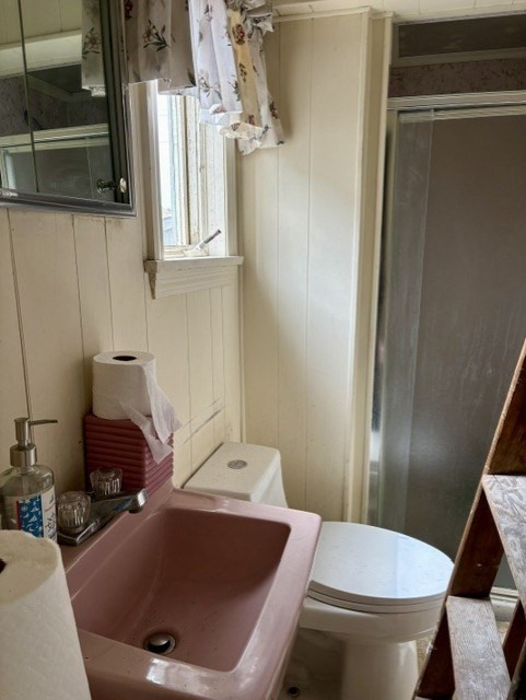 60 N Street Hull, MA 02045 - Photo 28 of 38 a bathroom with a sink and toilet