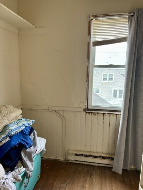 60 N Street Hull, MA 02045 - Photo 31 of 38 a view of walk in closet with clothes and shoes