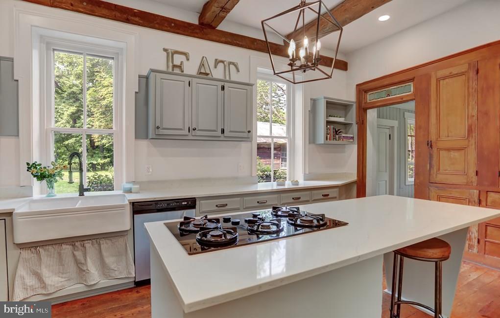 612 Old Rte 322 Spring Mills, PA 16875 - Photo 19 of 79 a kitchen with a stove a sink and a window