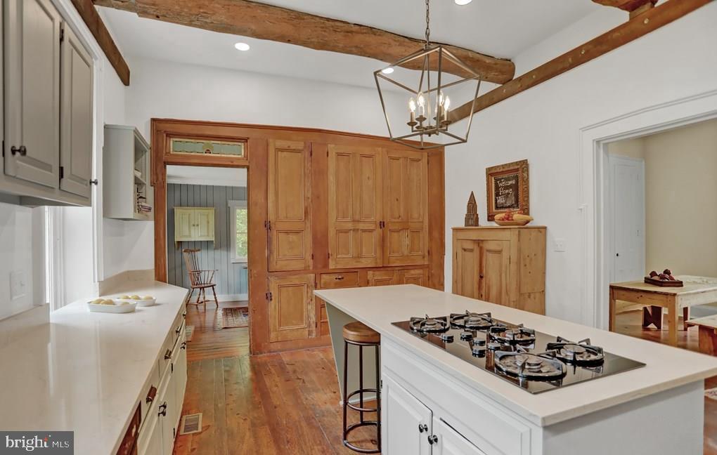 612 Old Rte 322 Spring Mills, PA 16875 - Photo 20 of 79 a kitchen with stainless steel appliances granite countertop a stove refrigerator and cabinets