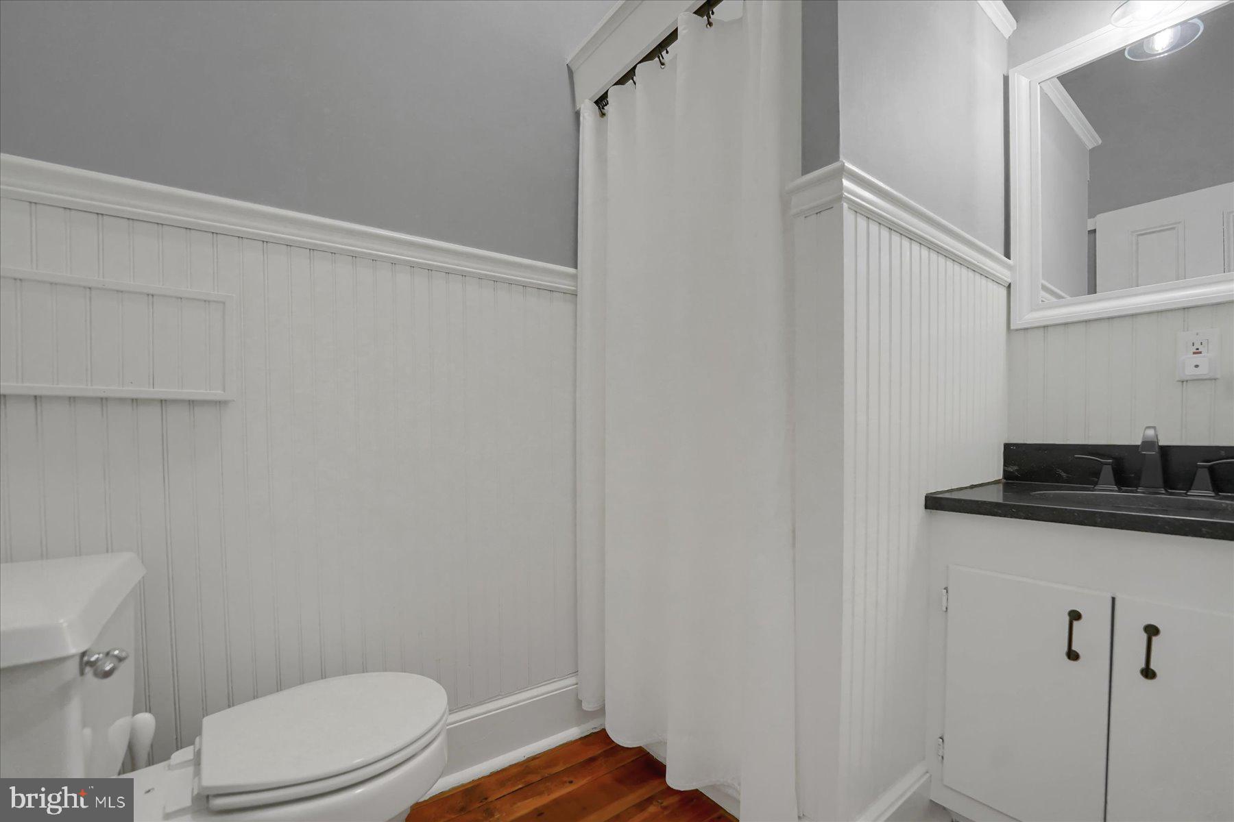 612 Old Rte 322 Spring Mills, PA 16875 - Photo 29 of 79 a bathroom with a granite countertop sink toilet and shower