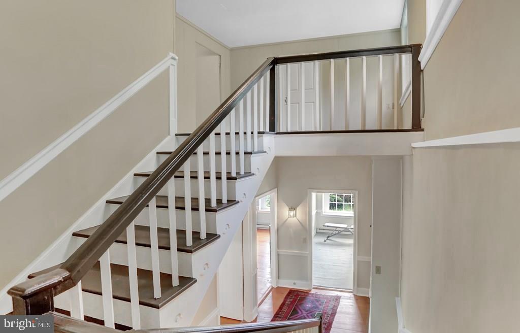 612 Old Rte 322 Spring Mills, PA 16875 - Photo 41 of 79 a view of entryway with wooden floor and stairs