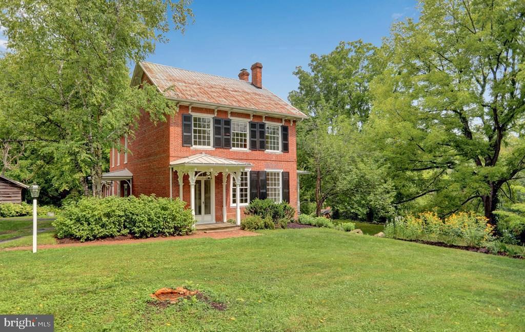 612 Old Rte 322 Spring Mills, PA 16875 - Photo 5 of 79 a front view of house with yard and green space