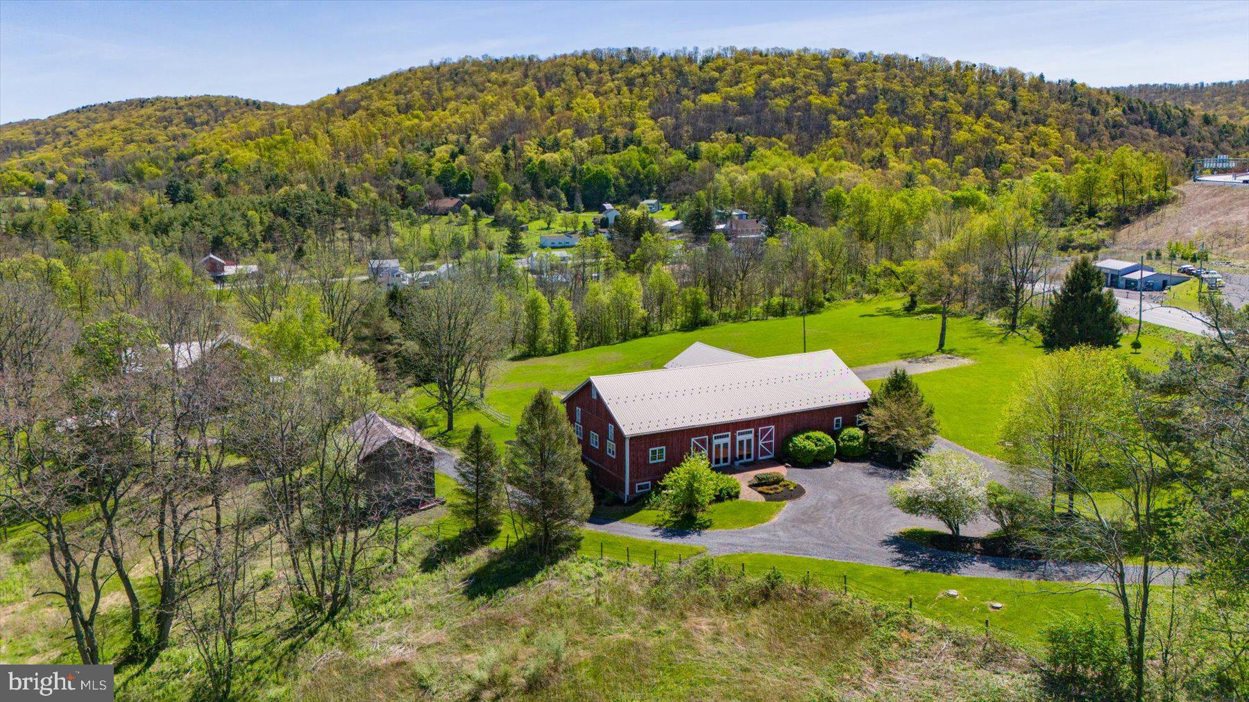 612 Old Rte 322 Spring Mills, PA 16875 - Photo 72 of 79 an aerial view of a house with a yard
