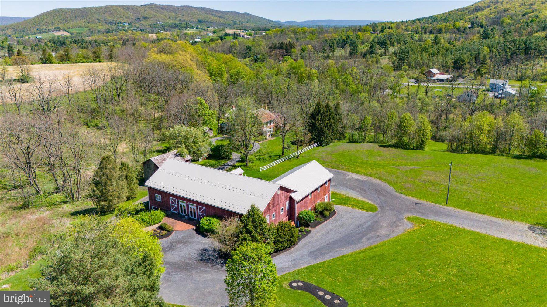 612 Old Rte 322 Spring Mills, PA 16875 - Photo 75 of 79 a view of a lake with a mountain in the background