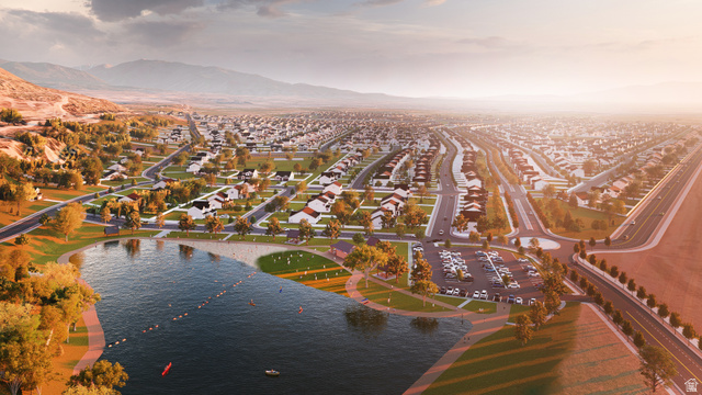 2032 East Dorset Way, Unit 286 Salem, UT 84653 - Photo 23 of 23 Expansive residential development featuring a large central lake with a sandy shoreline, a surrounding green space with mature trees, a dedicated parking area, and a network of paved roads
