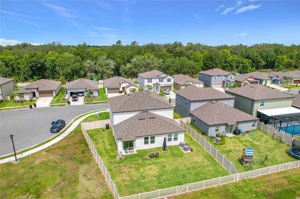 1633 Red Loop Lakeland, FL 33801 - Photo 50 of 60 an aerial view of residential houses with outdoor space and swimming pool