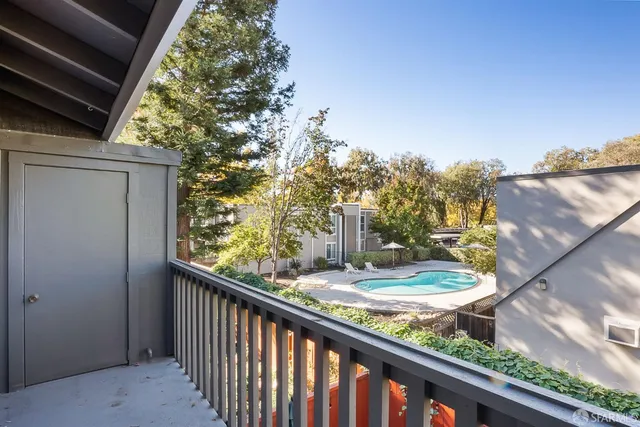 a view of a balcony with an outdoor space