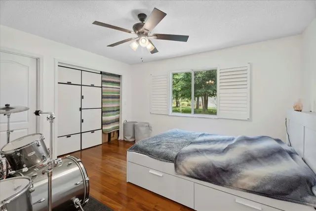 a view of a swimming pool with a yard