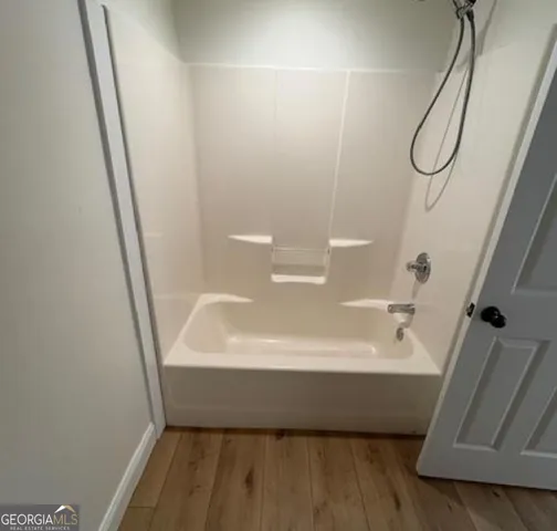 a view of balcony and yard