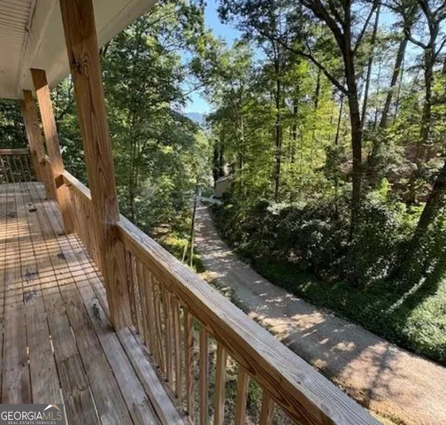 a view of a street with a tree