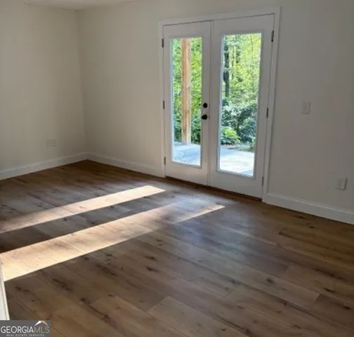 a view of an empty room and window
