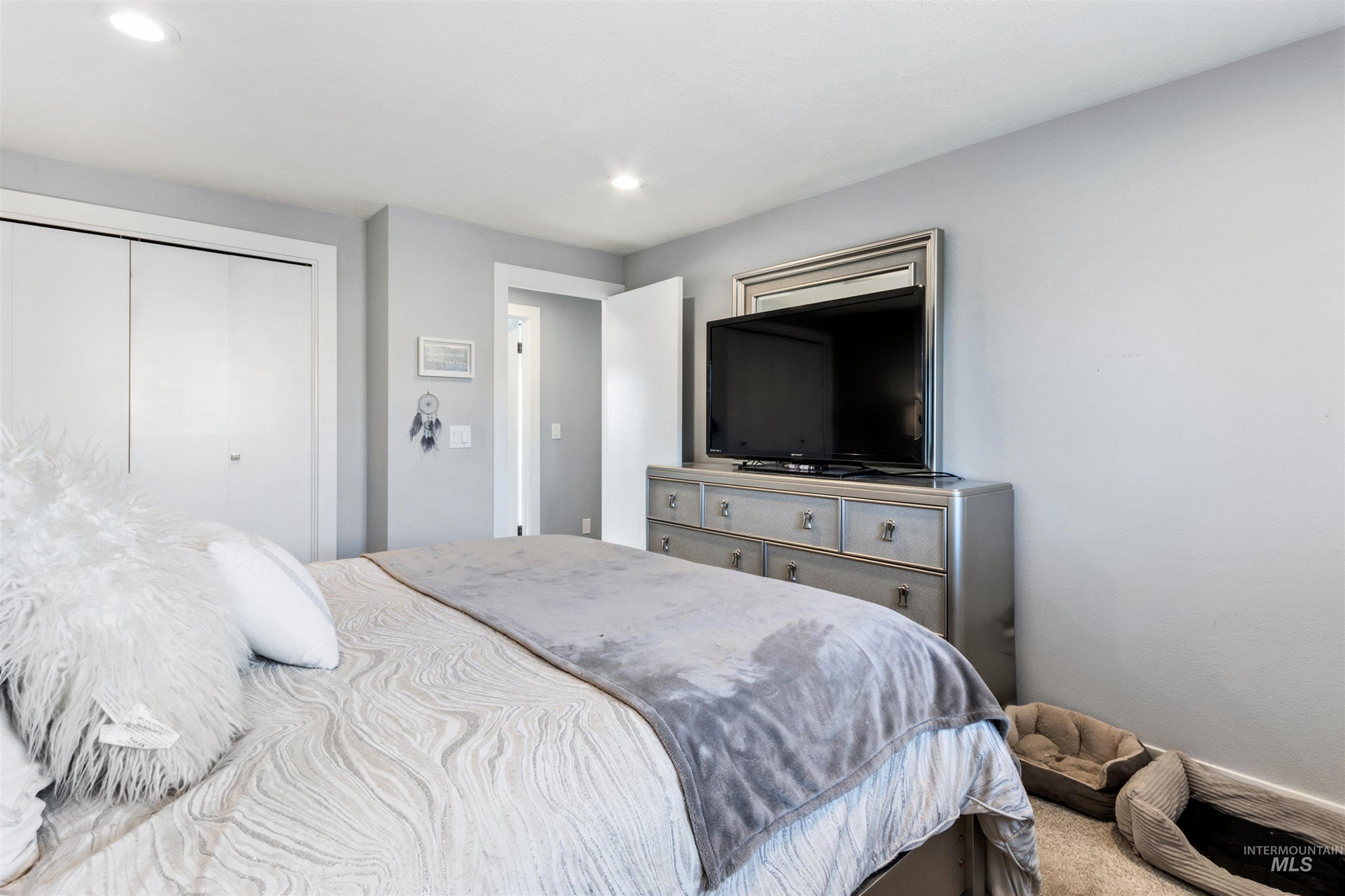 3844 North Patton Street Boise, ID 83704 - Photo 13 of 33 Bedroom featuring a closet and recessed lighting