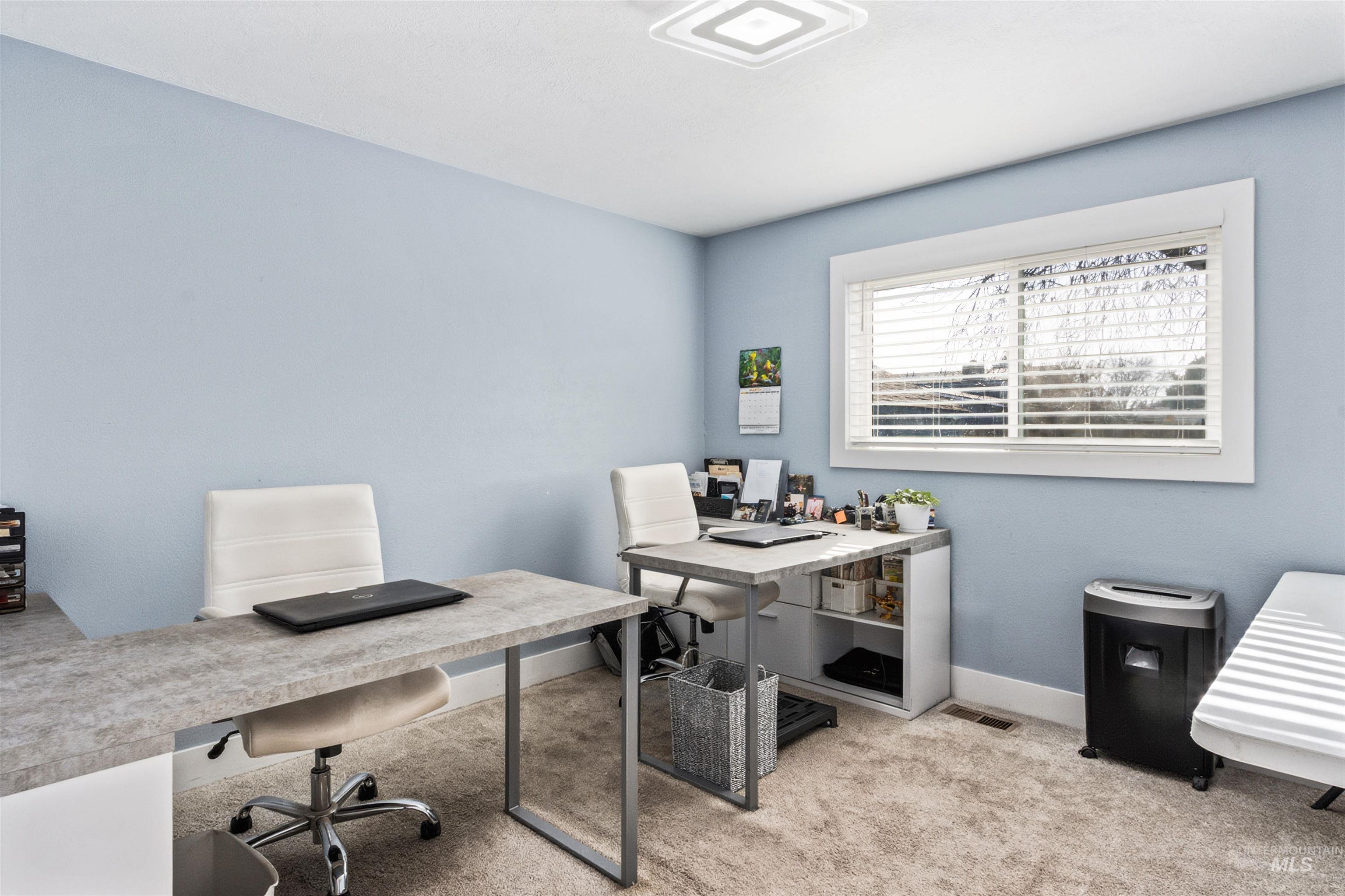 3844 North Patton Street Boise, ID 83704 - Photo 20 of 33 Office area with light colored carpet and baseboards