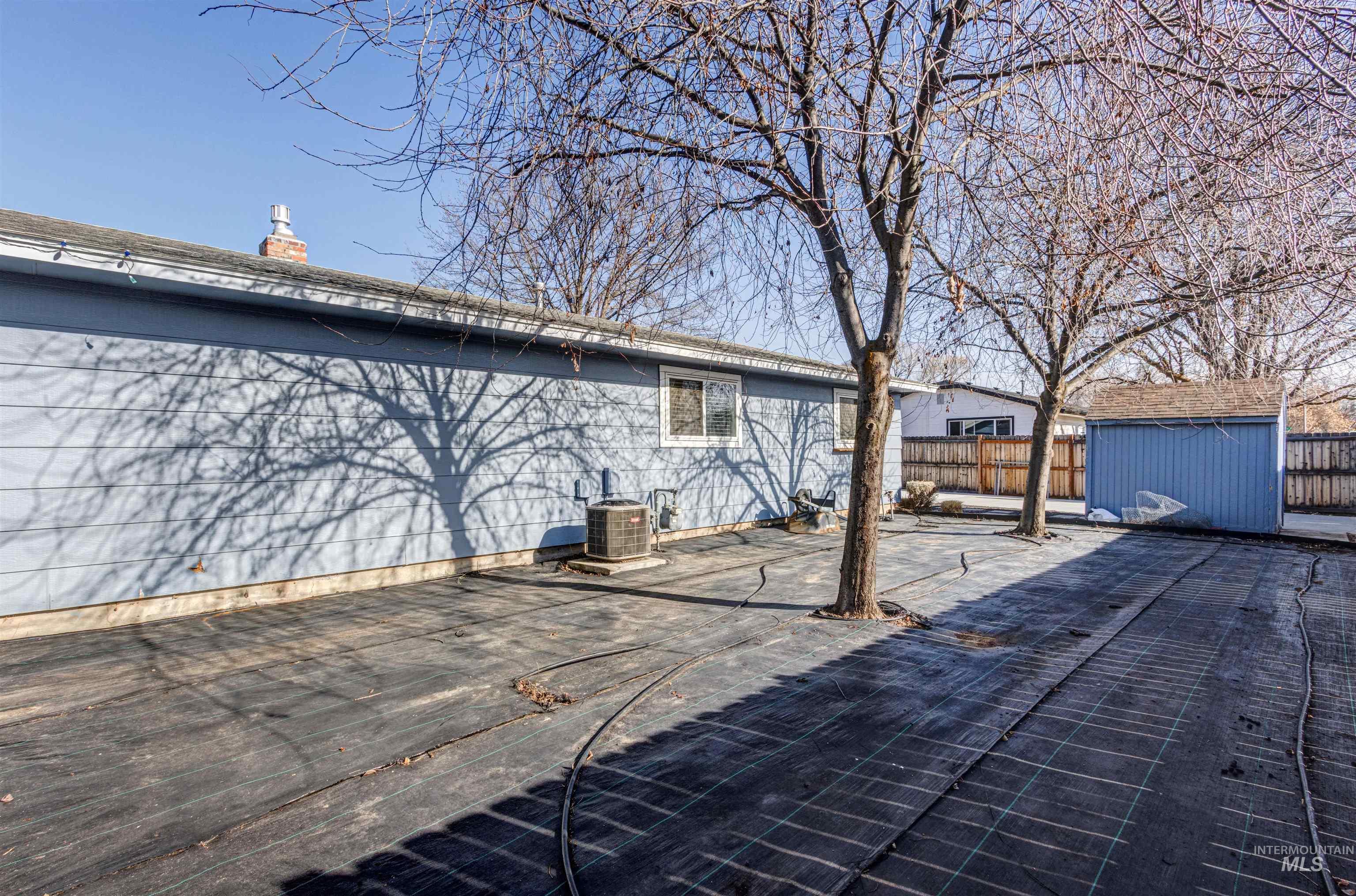 3844 North Patton Street Boise, ID 83704 - Photo 33 of 33 Deck with a storage shed
