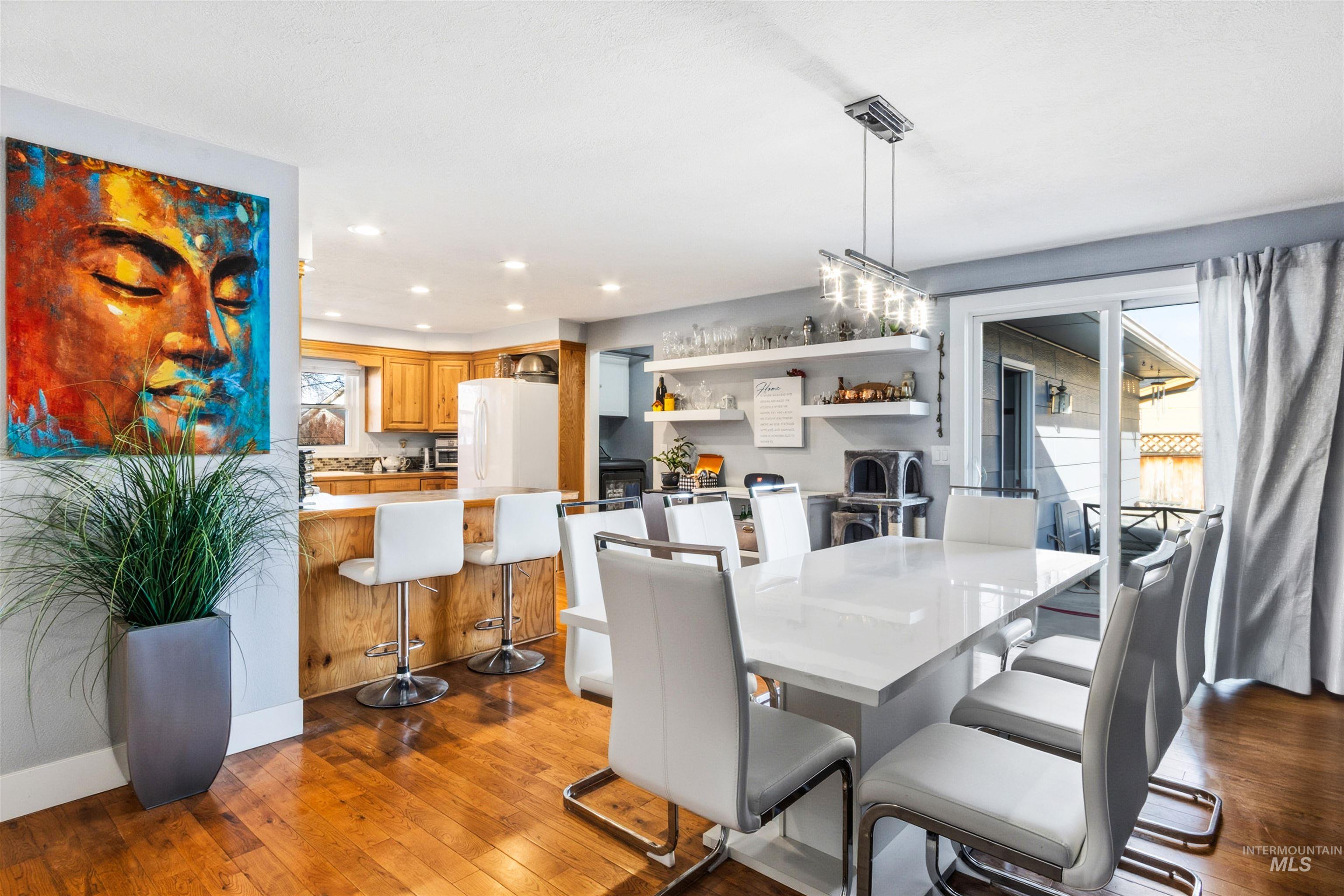 3844 North Patton Street Boise, ID 83704 - Photo 7 of 33 Dining space featuring dark wood-style flooring and recessed lighting