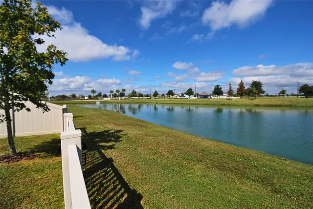a view of a lake with a city