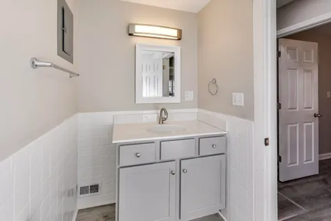 a sink with a mirror