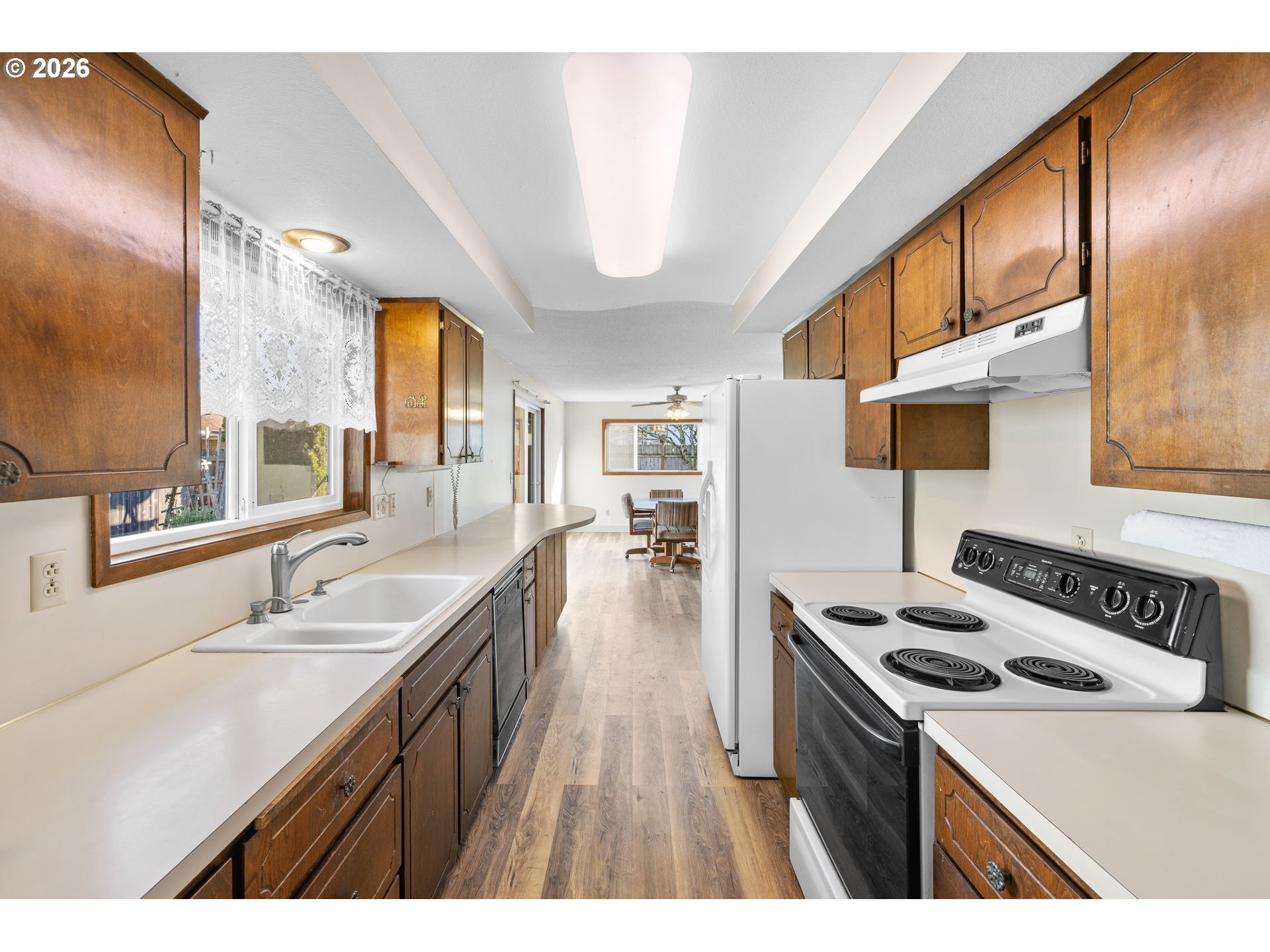 2216 Northeast 91st Street Vancouver, WA 98665 - Photo 12 of 30 a kitchen with stainless steel appliances a sink a stove and a refrigerator