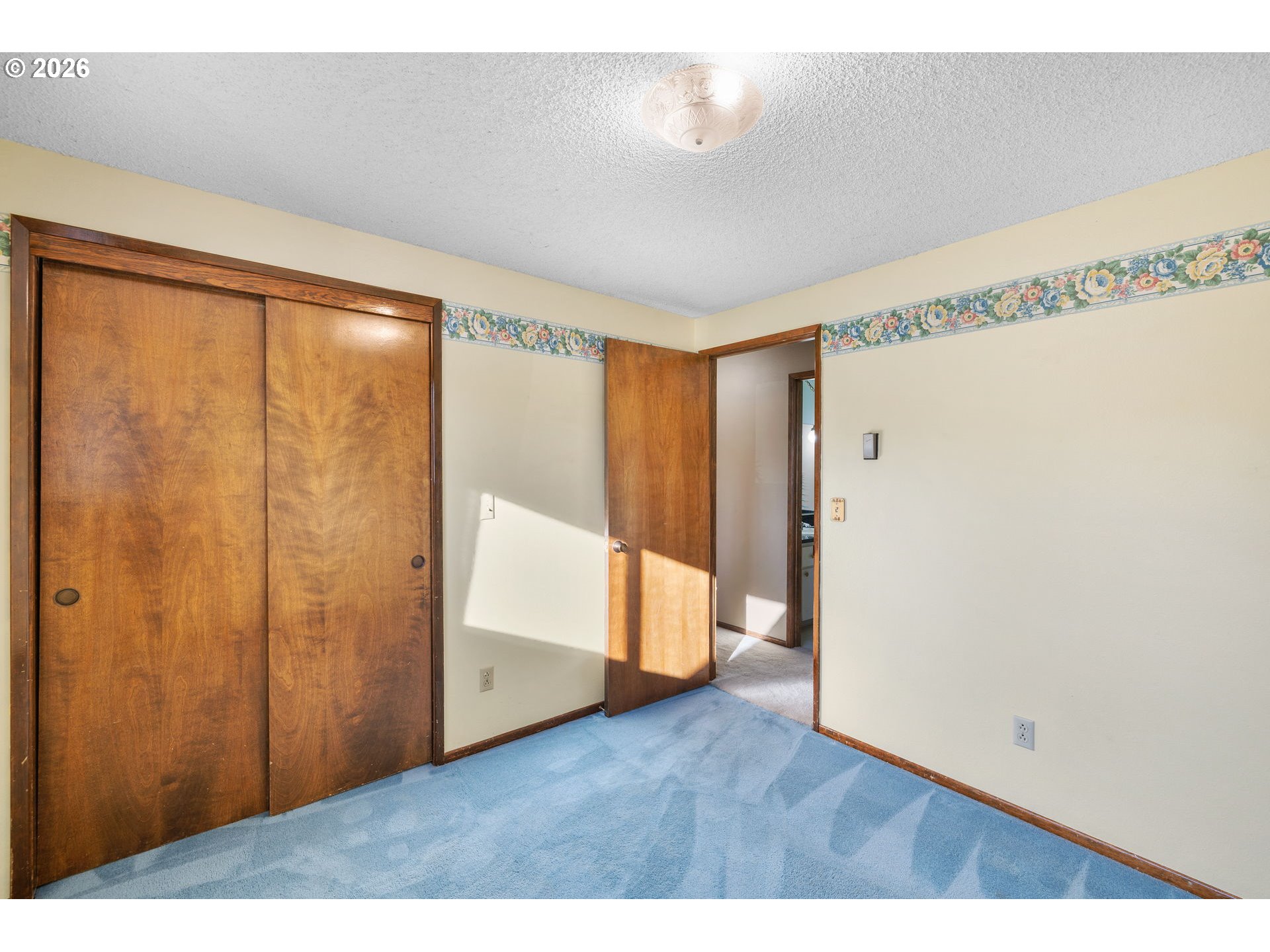 2216 Northeast 91st Street Vancouver, WA 98665 - Photo 17 of 30 a view of an empty room with wooden floor