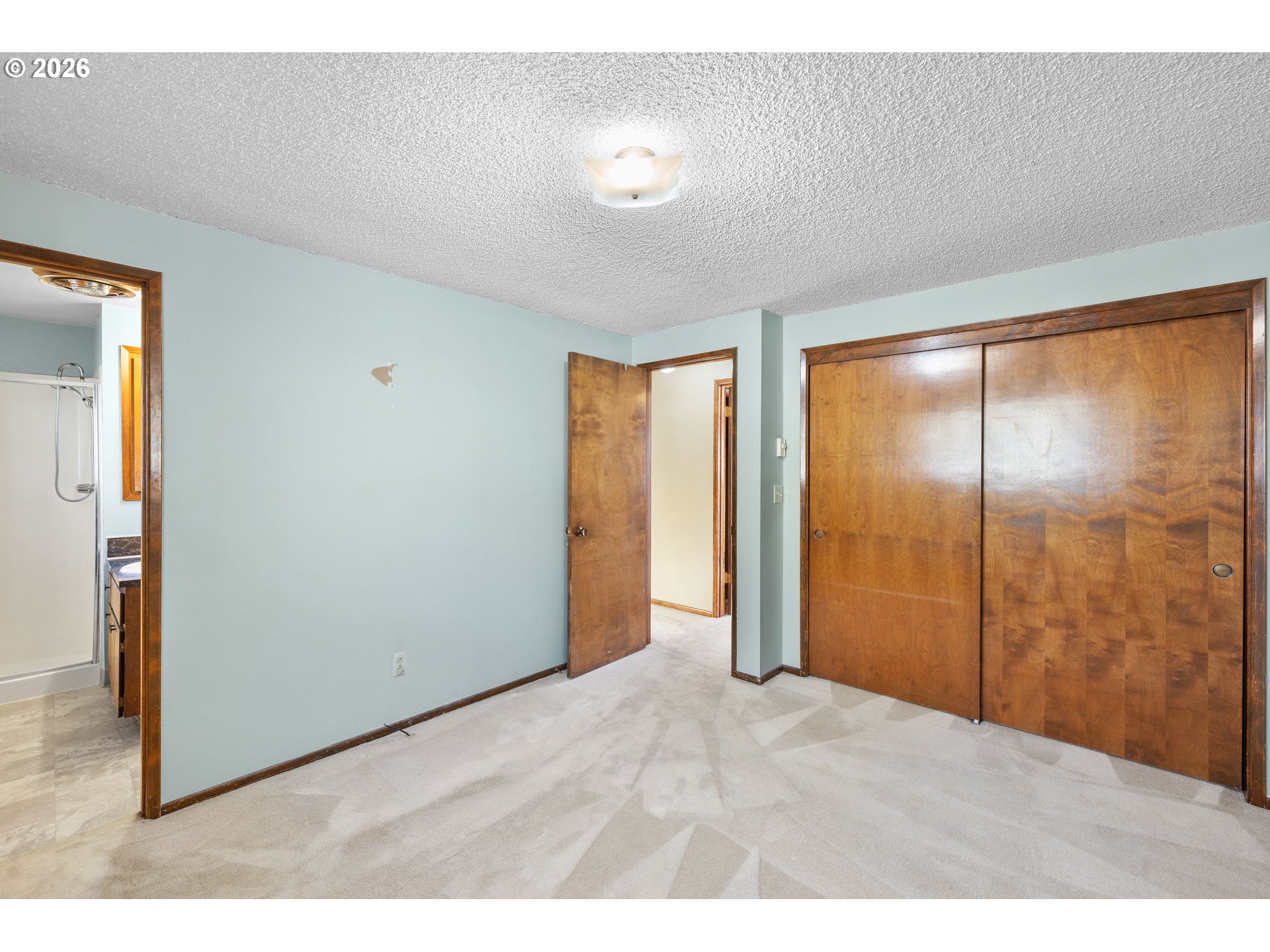 2216 Northeast 91st Street Vancouver, WA 98665 - Photo 22 of 30 a view of an empty room with window and bathroom