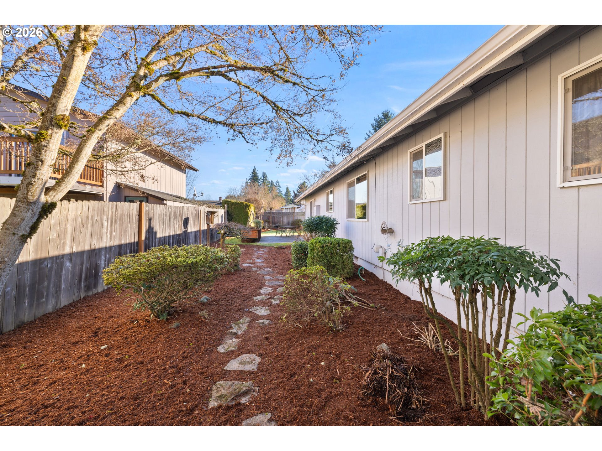 2216 Northeast 91st Street Vancouver, WA 98665 - Photo 25 of 30 a backyard of a house with plants and trees