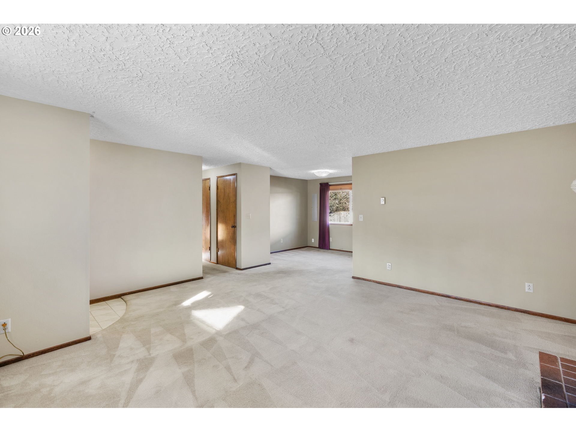 2216 Northeast 91st Street Vancouver, WA 98665 - Photo 9 of 30 a view of an empty room with wooden floor