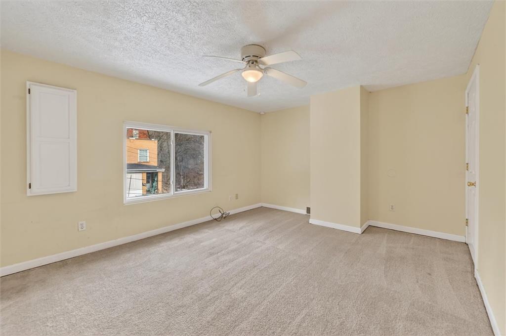 301 Milroy Street Pittsburgh, PA 15214 - Photo 16 of 24 a view of an empty room with a window