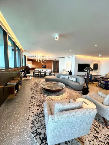 a living room with furniture and a couch