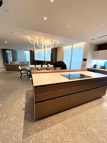 a bathroom with a double vanity sink mirror and bathtub