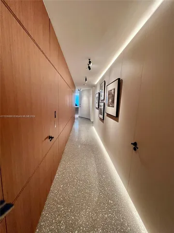 a view of a room with a furniture and closet