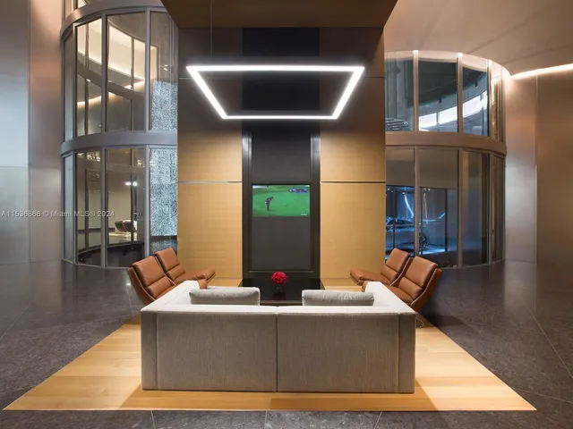 a room with lots of chairs and a projector