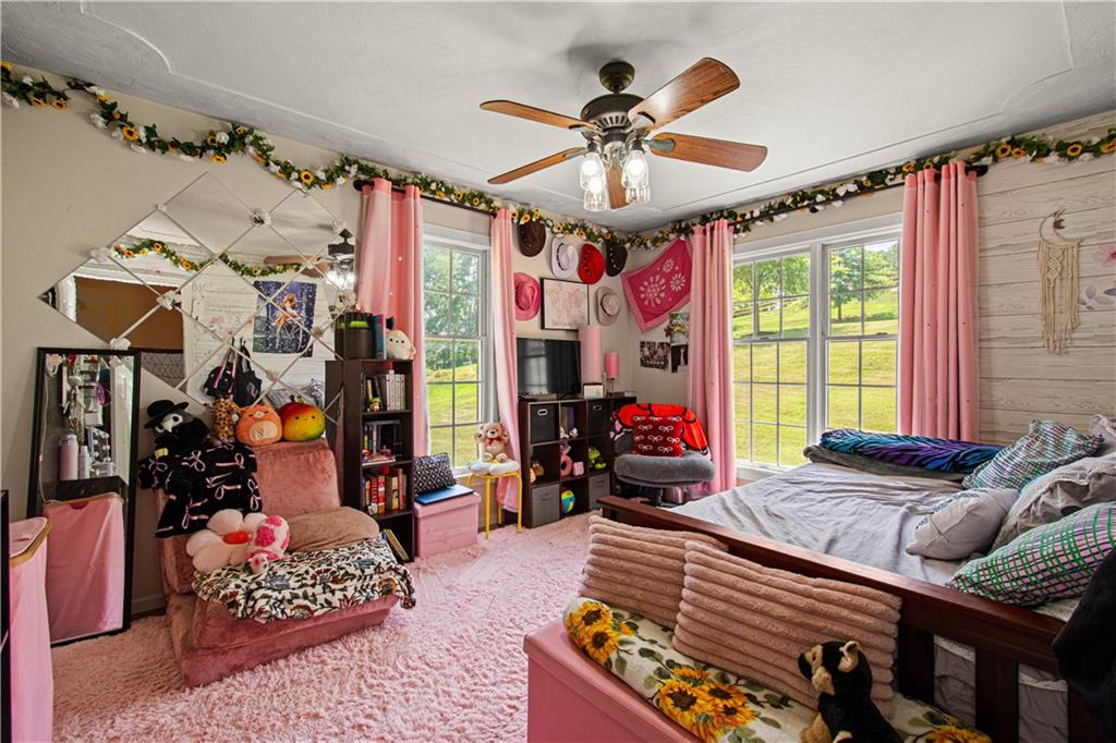 3054 Bedillion Road Washington, PA 15301 - Photo 27 of 47 Spacious bedroom perfect for family, guests, or hobbies.