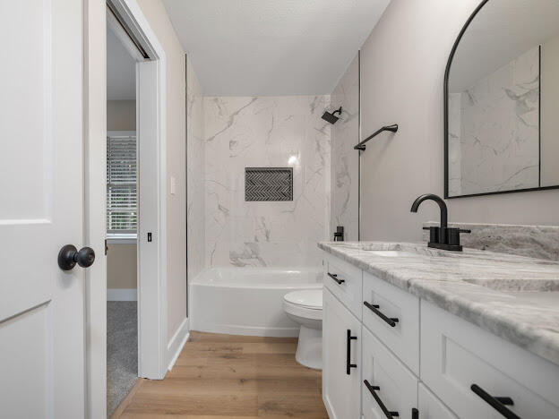 6180 Old Hickory Road Crestview, FL 32539 - Photo 11 of 31 a bathroom with a granite countertop sink toilet and shower