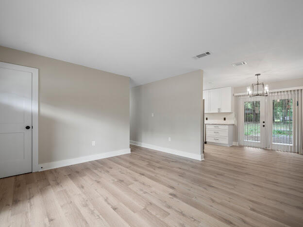 6180 Old Hickory Road Crestview, FL 32539 - Photo 18 of 31 a view of empty room with wooden floor