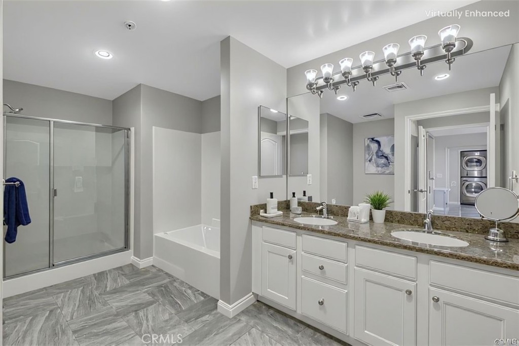 6800 Corbin Avenue, Unit 308 Reseda, CA 91335 - Photo 6 of 11 a spacious bathroom with double vanity and a mirror