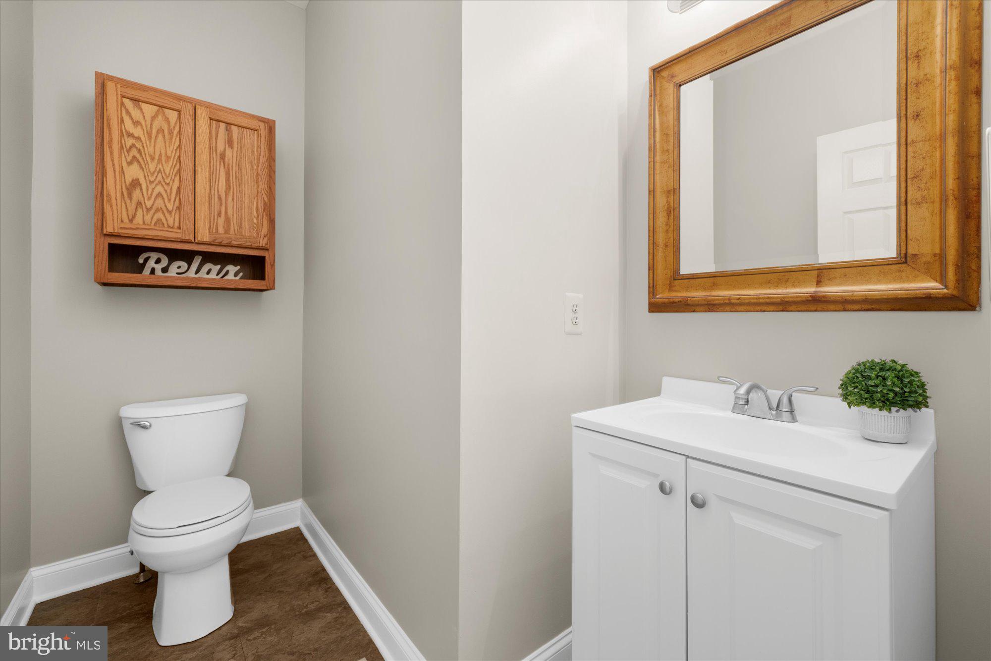 131 Appledale Road Norristown, PA 19403 - Photo 15 of 50 a bathroom with a toilet sink and mirror