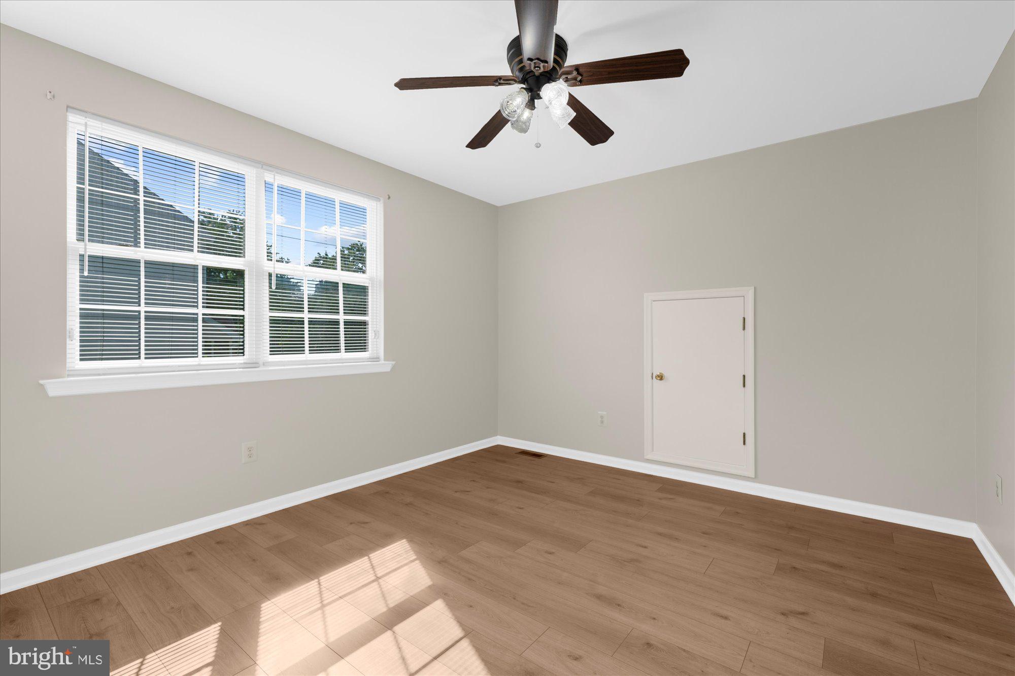 131 Appledale Road Norristown, PA 19403 - Photo 32 of 50 a view of empty room with wooden floor and ceiling fan
