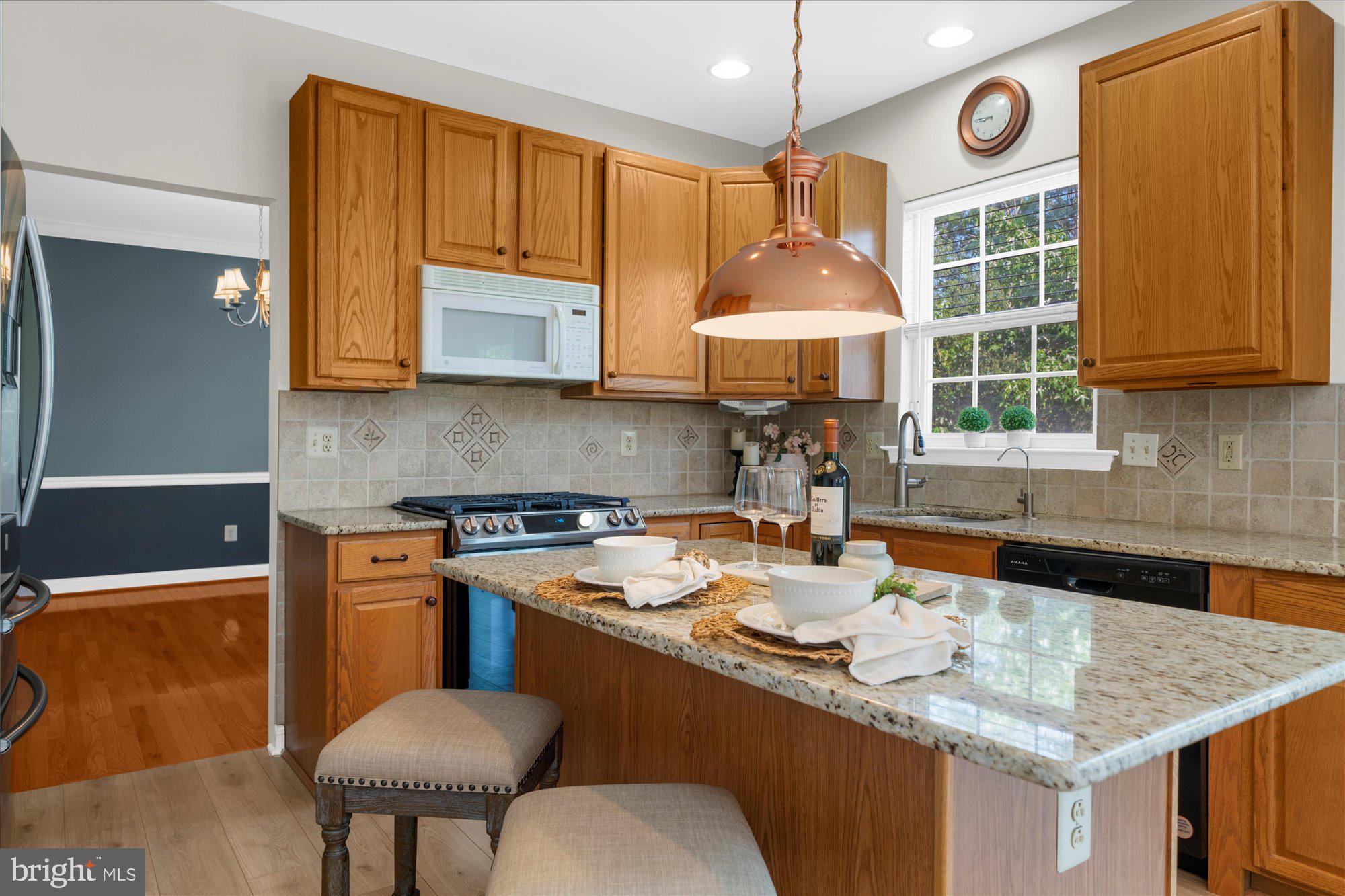 131 Appledale Road Norristown, PA 19403 - Photo 9 of 50 a kitchen with a sink stove and cabinets